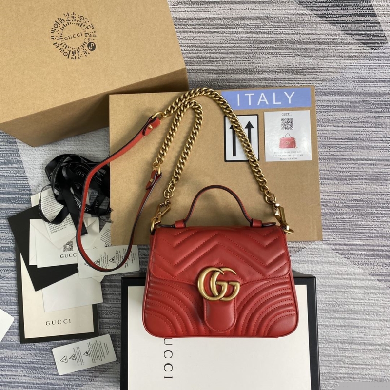 G*u*i top handle bags